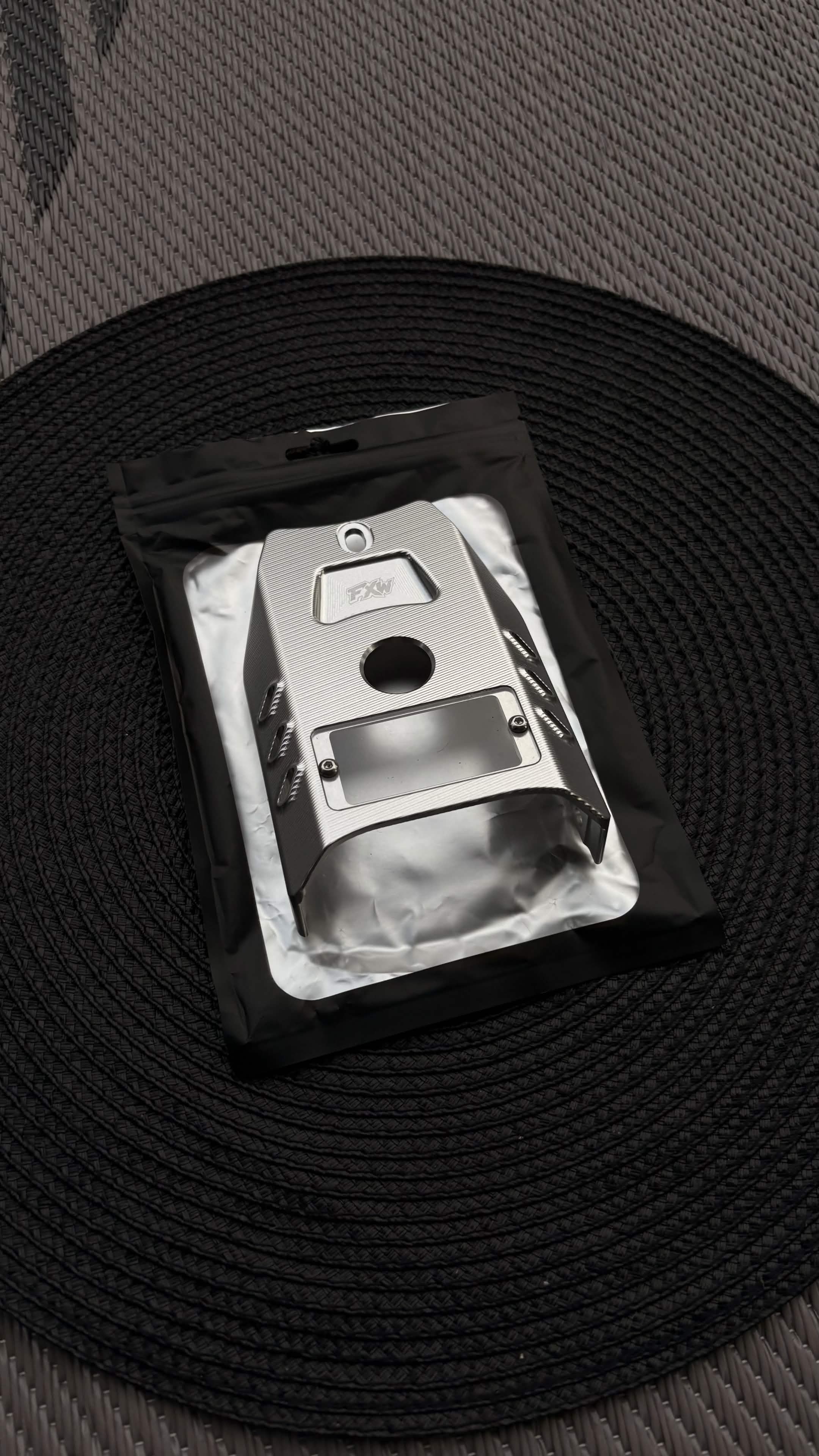 FxW Talaria XxX Metal Ignition Cover SILVER/BLACK