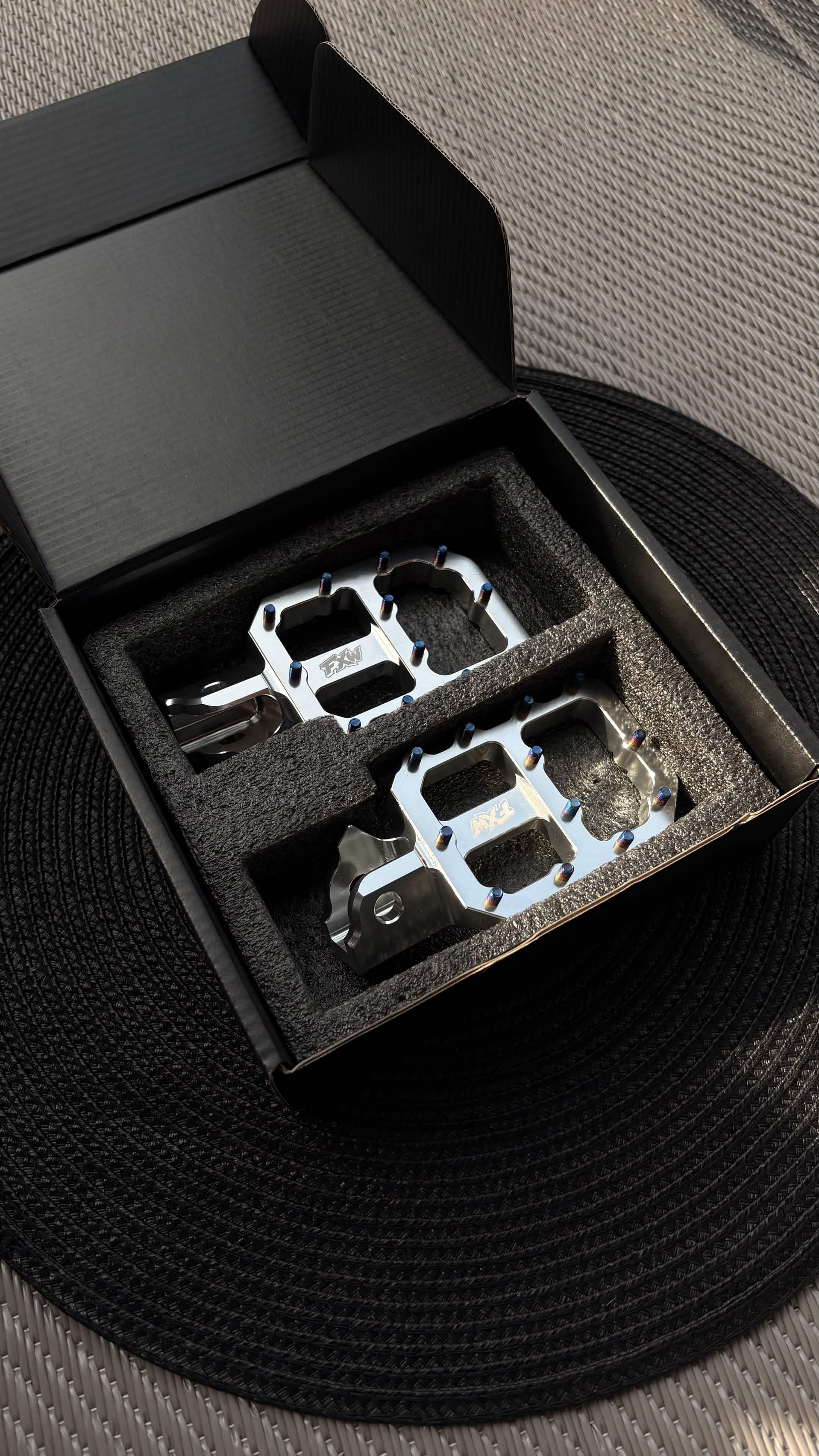 FxW Wide Footpegs with Titanium Bolts Black/Silver - Fits On Most Bikes