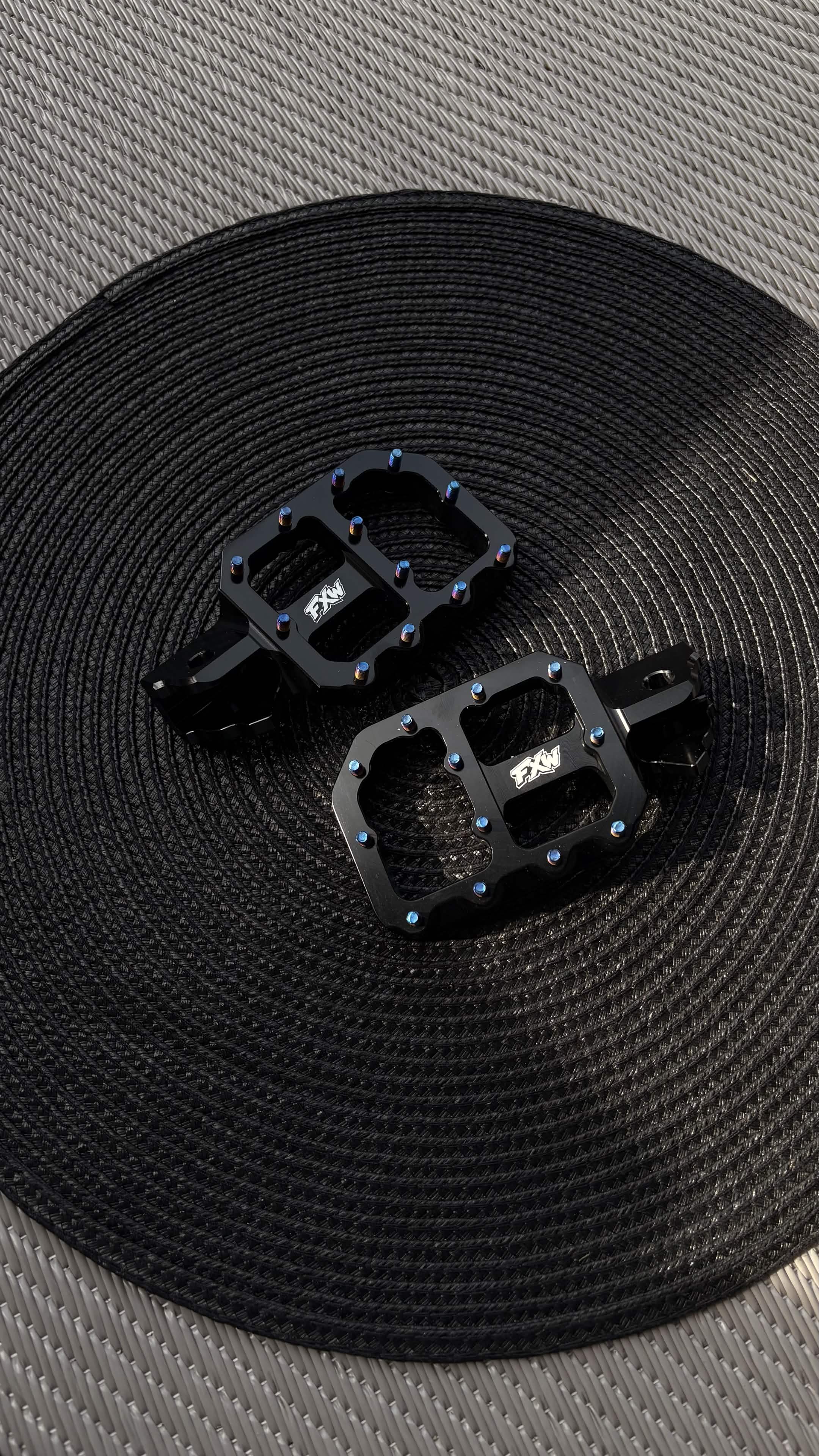 FxW Wide Footpegs with Titanium Bolts Black/Silver - Fits On Most Bikes